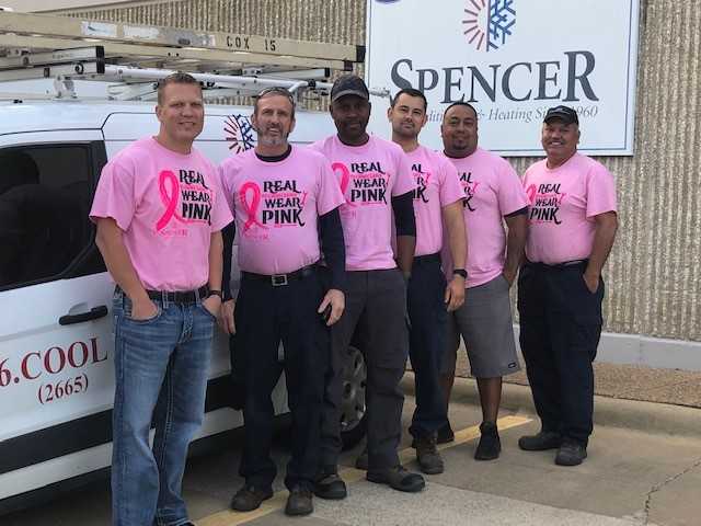 Spencers team with Pink uniform Photo