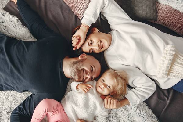 happy family enjoy the benefits of HVAC System